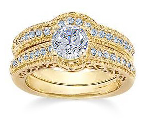 Engraved 1 Carat Round Estate Style Bridal Set with lab grown diamond alternative cubic zirconia in 14k yellow gold.