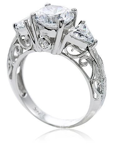 Pomeroy 1.5 carat round laboratory grown diamond quality cubic zirconia trillion engraved antique estate engagement ring in platinum.