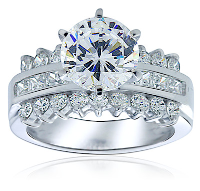Ruth 1.5 carat round lab grown diamond quality cubic zirconia engagement ring princess cuts and rounds in 14k white gold.