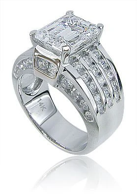 Ellise 4 carat emerald step cut lab grown diamond simulant cubic zirconia channel solitaire engagement ring in platinum.