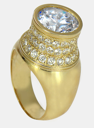 Round brilliant 4 carat bezel set lab grown diamond simulant cubic zirconia pave solitaire engagement ring in 14k yellow gold.