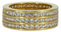 Three row channel set round eternity wedding band with lab grown diamond look cubic zirconia in 18k yellow gold.