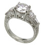 Vintage Glory 1.5 carat round lab created cubic zirconia and baguette engraved antique ring in 14k white gold.