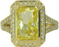 Emerald radiant cut canary lab grown diamond alternative cubic zirconia pave halo ring with a split shank in 14k yellow gold.