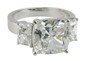 Lena cushion cut and emerald radiant cut lab grown diamond quality cubic zirconia three stone ring in 14k white gold.