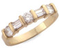 Round and double baguette lab grown diamond look cubic zirconia gemlock anniversary band in 14k yellow gold.