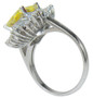 Emerald cut 2.5 lab grown diamond quality cubic zirconia halo cluster ballerina ring in platinum.