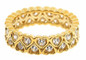 Channel set round laboratory grown diamond simulant cubic zirconia heart shaped eternity band in 18k yellow gold.