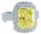 Montage 5.5 carat emerald cut lab grown diamond look cubic zirconia halo pave round engagement ring in 14k white gold.