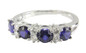 Daniella alternating man made sapphire and lab diamond simulant cubic zirconia round anniversary band in 14k white gold.