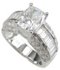 Elongated cushion cut 2.5 carat laboratory grown diamond alternative cubic zirconia pave and baguette ring in 14k gold.