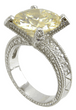 Art Deco styled 4 carat round lab created cubic zirconia pave engraved solitaire in 14k white gold.