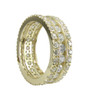 Three row channel set lab grown diamond simulant cubic zirconia prong set round eternity band in 14k yellow gold.