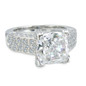 Cushion cut 4 carat laboratory grown diamond simulant cubic zirconia pave solitaire engagement ring in platinum.