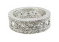 Round bezel, prong and pave set lab grown cubic zirconia eternity band in platinum.