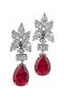 Pear cluster earrings with a 5 carat man made ruby pear drop in 14k white gold.