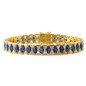Deco Trillion Sapphire Marquise Bracelet with lab grown diamond quality cubic zirconia in 14k yellow gold.