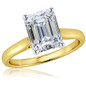 Emerald step cut lab grown diamond simulant cubic zirconia cathedral solitaire engagement ring in 14k yellow gold with white gold prongs.