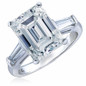 Emerald step cut lab grown diamond alternative cubic zirconia baguette solitaire engagement ring in 14k white gold.