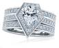 Pear 2 Carat Pentagon Shape Halo Cathedral Three Ring Set with lab grown diamond simulant cubic zirconia in platinum.