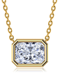 Radiant emerald cut bezel set lab created diamond look cubic zirconia horizontal solitaire pendant in 14k yellow gold.