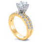 Round 1.5 carat solitaire and matching band wedding set with lab grown diamond look cubic zirconia in 14k yellow gold.