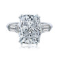 Elongated cushion cut laboratory grown diamond quality cubic zirconia baguette solitaire ring in 14K white gold.