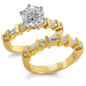 Alternating 1.5 Carat Round and Baguette Channel Bridal Set with laboratory grown diamond simulant cubic zirconia in 14k yellow gold.