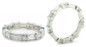 Baguette and round lab grown diamond alternative cubic zirconia channel set bar set eternity band in 14k gold.