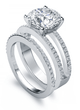 Britney Round Micro Pave Split Shank Wedding Set with lab grown diamond quality cubic zirconia in 14k white gold.