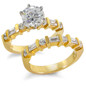 Alternating 1.5 Carat Round and Baguette Channel Bridal Set with simulated lab grown cubic zirconia in 14k yellow gold.
