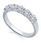 Scalloped 1.5 Carat Round Prong Set Band with lab grown diamond look cubic zirconia in platinum.