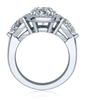 Oval 2.5 carat laboratory grown diamond alternative cubic zirconia pave halo and pear sides engagement ring in platinum.