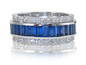 Channel set man made sapphire baguette and round eternity wedding band with lab grown diamond simulant cubic zirconia in platinum.