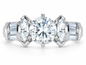 Round marquise and channel set baguette lab grown diamond look cubic zirconia solitaire engagement ring in 14k white gold.