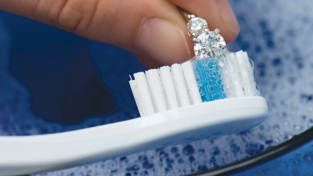 Cleaning your ziamond jewelry with toothbrush and mild detergent