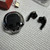 1 box Black great wall bluetooth headset with instructions and charger.