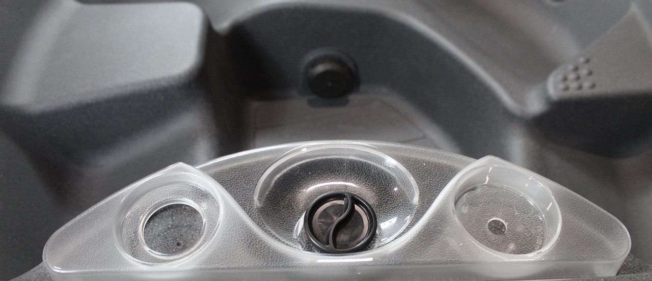 The emotion of your personal spa paradise will be absorbed by a Feeling like you’ve never known. The Feeling calls your name. It combines styling, comfort, ambience, serviceability and exceptional massage all in one truly portable and affordable spa. As its name suggests, the Feeling will trigger your emotions and command your attention. It’s sleek, modern design not only exudes practical features, but it also blusters with features like a back lit, cascading waterfall, external LED sconce lighting, hand recesses for easy portability and 100% accessibility to the plumbing and equipment. With unequaled comfort, ambience and practicality, the Feeling delivers a truly gratifying spa ownership experience.

The layout of the Feeling follows a traditional pattern with added versatility. You can relax in either of the two opposing lounge chairs or you can stretch your legs out and lay back in the full length lounge chair. The lounge chair also enables you to swing your legs around, sit up and enjoy a family conversation. The Feeling also contains a step in / cool down seat for easier and safer entering and exiting to and from the spa. This step also doubles as a cool down seat. If total emersion in the water makes you feel a bit overheated, sit on the cool down seat and enjoy the hot water comfort under your terms.

The Feeling is a true “Plug & Play” portable spa. It needs no special site preparation (must be level). The bottom of the Feeling is totally protected and the spa can be set on any solid level surface. No electrician is needed. The Feeling comes standard with a 15’, 120V GFCI protected cord that is ready to be plugged into a dedicated 15 amp standard wall receptacle. For those who plan to use their spa for long periods of time in cold weather, it can also be converted to 240V (electrician required) operation for better heating efficiency. The Feeling is very portable. It weighs approximately 350 lbs., dry weight, and it has built in hand recesses for easy lifting and handling. It can easily be transported in the back of most pick-up trucks, on a small trailer or in a moving truck so you don’t ever have to worry about leaving your spa behind again. The Feeling is for simplicity, comfort, quality, portability, and affordability. Now available at western tub and pool 1-855-248-0777 or 1-403-248-0777