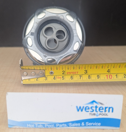 Recycled Beachcomber Medium Massage Style Snap In Jet Insert - 2011+  Britewerx accessories are known for their chrome-like finish and high resistance to tarnishing and corrosion. Use them to upgrade your spa's appearance while also benefiting from long-lasting performance. Ideal for those who prioritize aesthetics as well as durability in spa components.  This medium recycled replacement jet insert is designed for models manufactured from 2011 onwards. It ensures a precise fit and compatibility for users with newer spa models, providing easy upgrades or repairs without guesswork.  Unleash the luxury of personalized relaxation with a Recycled Beachcomber Britewerx medium Jet insert, the ultimate water jet designed for spa hydrotherapy.  Crafted with a premium chrome finish, it not only ensures long-lasting durability but also adds a touch of sophistication to your spa setup. Seamlessly blending functionality with elegance, Britewerx is the perfect addition to elevate your relaxation routine.  Non Posi lock system ( snap-in ) Britewerx style Massage Jet 3" across the face For Beachcomber Hot Tub Models with non Posi lock fitting type from 2011 onwards Massage effect: Beachcomber’s medium size massage jet offers three separate jets. This full body massage jetting system is enhanced by a rotating centrifuge that distributes the water through the 3 jet holes to provide a vigorous massage. Colour: Chrome recycled from older beachcomber hot tubs Built by waterways described as a massage jet " snap " in style While there may be minor wear and discoloration due to the product being recycled, rest assured that all our jets are in good condition with durable snap-in clips.***Please note that the availability of this recycled part may vary based on stock. We strive to keep our inventory freshly rotated, so you can always find what you need. If this product is out of stock, please add it to your wish list to be notified when new stock arrives.  By properly maintaining your hot tub, you can ensure that it stays in top condition and provides you with a relaxing and enjoyable experience every time you use it. And by choosing recycled replacement parts, you can also do your part in promoting sustainability and reducing waste.