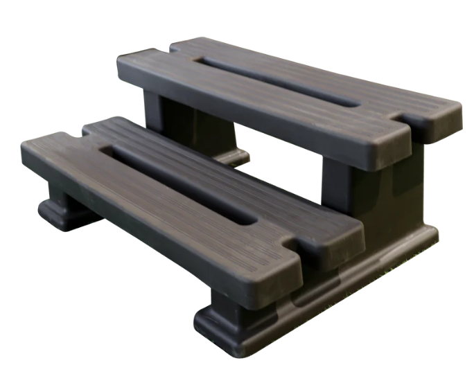 Get the Canadian Spa PVC Step    Ensure a safe and sturdy entry to your spa with the Wide Canadian Spa Company PVC step. Find the exact replacement part you need to keep your hot tub in perfect working condition. [Shop and order at Western tub and pool]  Built for safety and durability Slip-resistant surface Enjoy peace of mind with a textured surface designed to prevent slips and falls when entering or exiting your hot tub, even when wet.  UV and weather resistant Crafted from high-quality PVC, this step is engineered to withstand harsh weather conditions and resist fading from prolonged sun exposure, ensuring it looks great year after year.  Simple installation Get back to relaxing in no time. This replacement PVC step is designed for a seamless fit compatible with most spa models, requiring minimal effort to install.  Dimensions These PVC Steps are available in both narrow and wide and colour options include brown and black to seamlessly blend into your outdoor oasis.  Narrow:  Length: 23 inches Width: 27 inches Height: 15 inches Material: Heavy-duty PVC Wide:  Length: 24 inches Width: 35 inches Height: 13.5 inches Material: Heavy-duty PVC Hard to find product part assistance Struggling to find the exact hot tub or spa part you need? We are here to help. Send us an email at fixmytub@gmail.com for dedicated assistance.  To help us find your part faster, please check your part number if known, or send us pictures, the make and model of the hot tub, and the serial number.  Frequently asked questions How do I know if this step will fit my hot tub? This step is compatible with most hot tub models.  What should I do if I cannot find my part number? If you are unable to locate the part number, simply take a few clear photos of the part you need to replace, along with your hot tub's make and model. Email these details to fixmytub@gmail.com, and our experts will identify the correct replacement for you.  How quickly can I get this replacement part? We process orders rapidly to ensure your spa is out of commission for as little time as possible. Contact us at 1-855-248-0777 for specific shipping times and availability to your location.  Ready to upgrade your outdoor oasis? [Shop and order at Western tub and pool]