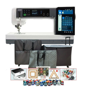 Janome Continental M17 Professional Sewing & Embroidery Machine with included accessories