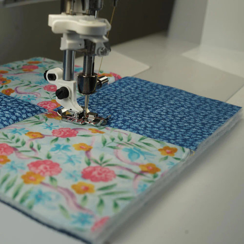 ADJUSTABLE STITCH-IN-DITCH FOOT FOR IDF SYSTEM