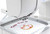 Close-up of the embroidery hoop with a design being sewn on the Janome Memory Craft 1000 