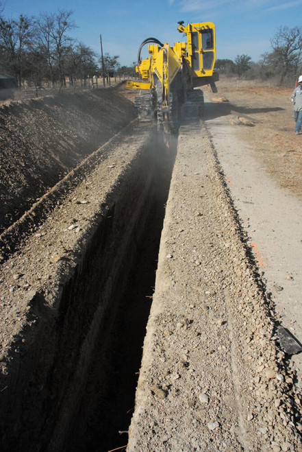 https://www.vermeer.com/getmedia/c9e0c2c1-d3e8-42de-ad42-d5626a805ed0/vermeer-t955iii-pipeline-trencher-in-action?width=670&height=1001&ext=.jpg