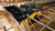 https://www.deere.com/assets/images/common/industries/construction/attachments_side_discharge_bucket_2upblknest_Large_1366x768_R4D027928_RRD_1.jpg