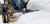 https://www.deere.com/assets/images/common/industries/construction/Snowblower_SkidSteer_S&N_Medium_991x467_JD_326E_517079_CGI_6_RGB_72dpi.jpg