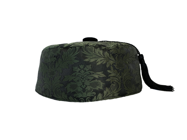 Our olive brocade smoking cap with black lining is sure to keep your head warm and enhance your style.  Topped off with a black velvet button with removable tassel. 

Unisex styling.  Available in sizes Small to 3X.  See cap sizechart for best fit. 

Dry Clean Only.
