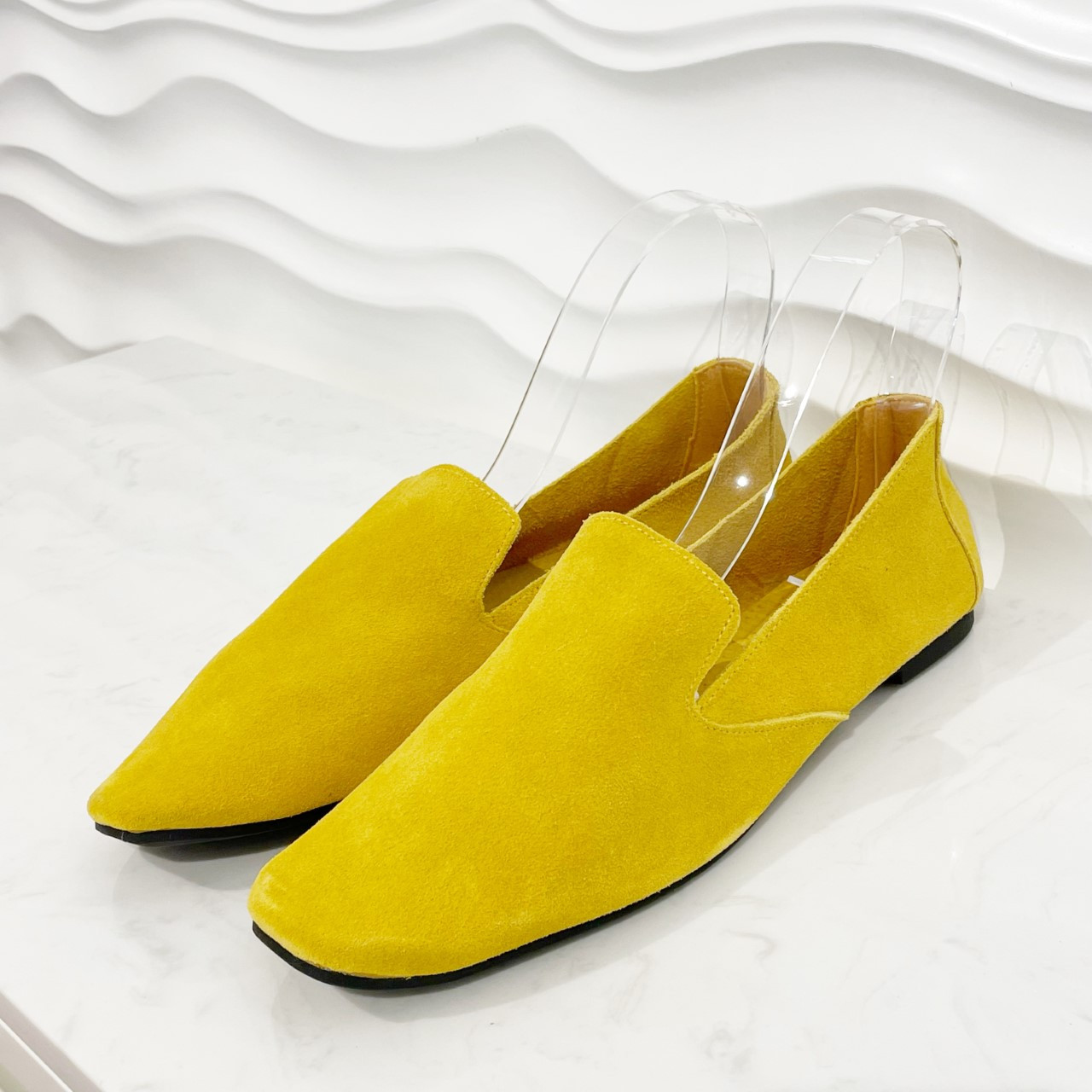 yellow loafers with spikes