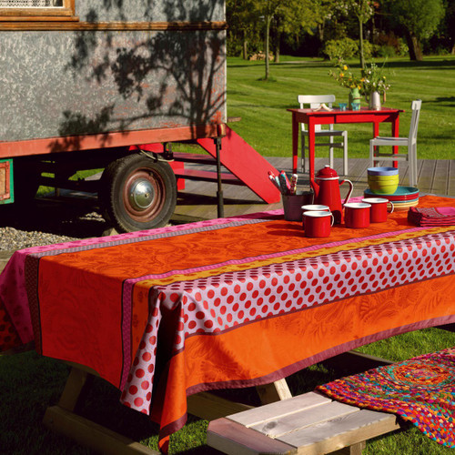 Le Jacquard Francais Zingaro Enduite Orange Coated tablecloth 55 x 102 Inch
