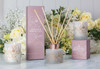 Imagine the delicate scent of Lily, jasmine, and rose petals intertwining with the warmth of ginger, bergamot, and clove.